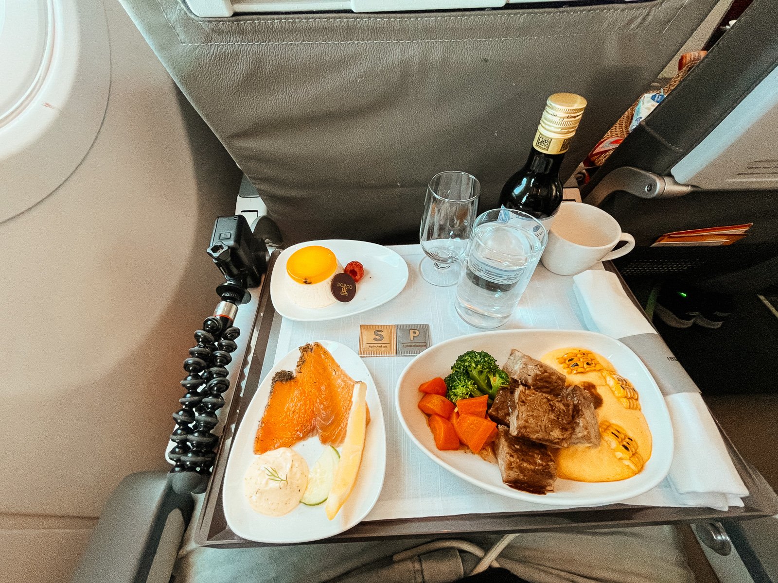 Iberia A320 Business Class lunch service. Starter - Smoked Salmon. Main Course - braised pork shank. Dessert - Panna Cotta