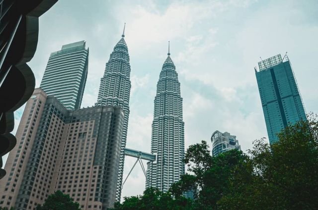 The Petronas Towers are an iconic symbol of Kuala Lumpur, Malaysia's capital.On this occasion, we didn't venture inside. Despite this, we were still impressed by the structure and its dramatic impact on the skyline of this bustling city.#travelexcuses #Malaysia #kualalumpur #architecture #travel #archilovers #asia